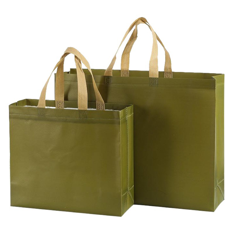 En stock película publicitaria bolso no tejido impermeable protección del medio ambiente ropa zapatos bolso de compras en blanco logotipo impreso