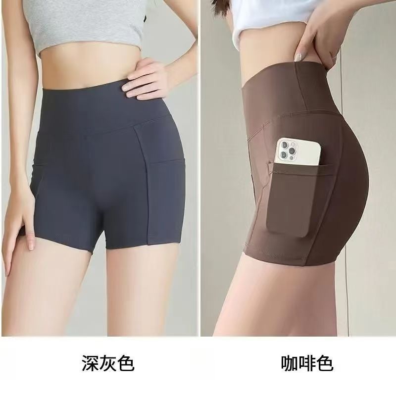 Nuevos pantalones de bolsillo de tiburón leggings para mujeres desnudas tres puntos de cintura alta pantalones de seguridad abdominales ajustados pantalones cortos de yoga adelgazantes