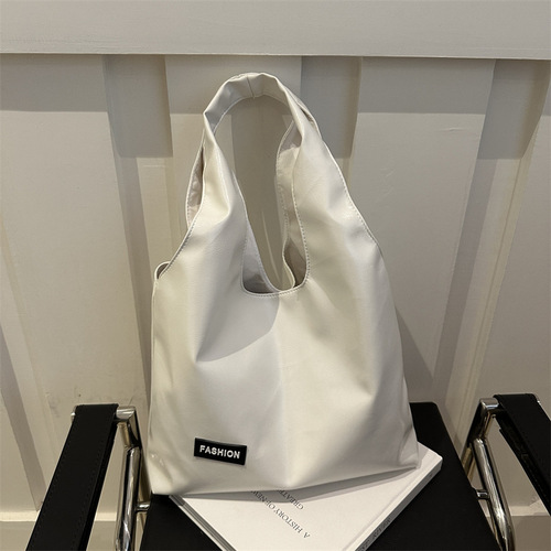 Korean-style large-capacity casual shoulder bag, niche hand-held tote bag, fashionable soft face commuting bag for women