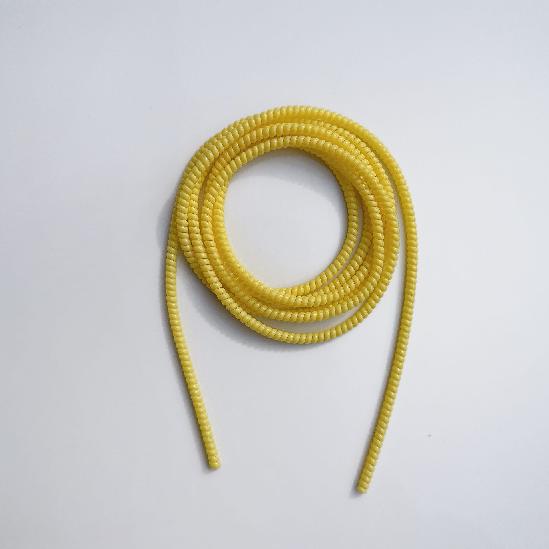 1.4 Cuerdas de protección de color sólido de 1,6 metros de cable de datos para línea de teléfono celular anti-ruptura cargador de cable de bobinado