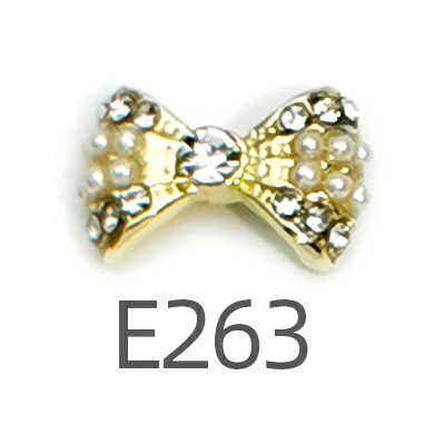 Transfronterizo Japonés arco de uñas accesorios de pajarita caliente simple todo fósforo tridimensional hueco joyería de uñas de diamantes al por mayor