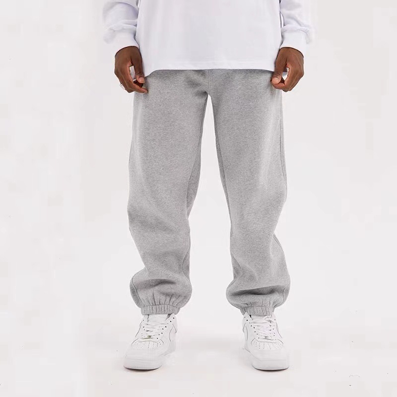 Pantalones pesados de marca de moda de algodón puro sueltos pantalones deportivos de pierna recta pantalones largos de otoño y invierno pantalones de pierna ancha de color sólido