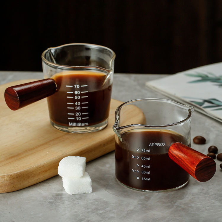 Transparent glass concentrated coffee measuring cup scaled