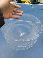 Wholesale supplier of white shrimp nets, lobster nets, fish traps, and fishing nets with three circles