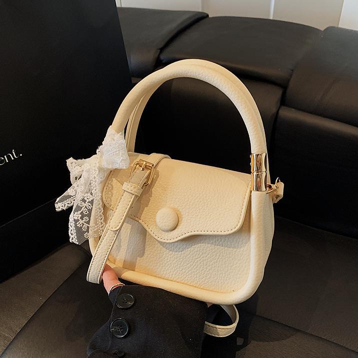 Casual tendencia portátil mini bolso 2025, nuevo nicho de bolso de hombro universal, sensación de alto nivel, simple mochila para mujeres