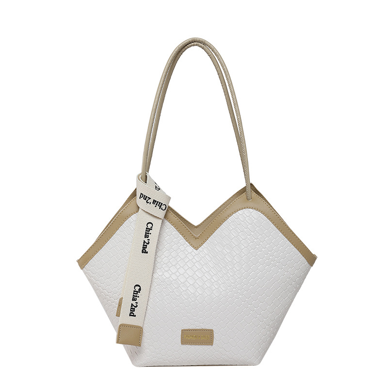 Bolsos de gran capacidad para mujer 2025 nuevo estilo retro patrón tejido bolso de axilas de un solo hombro textura de moda bolso de viaje