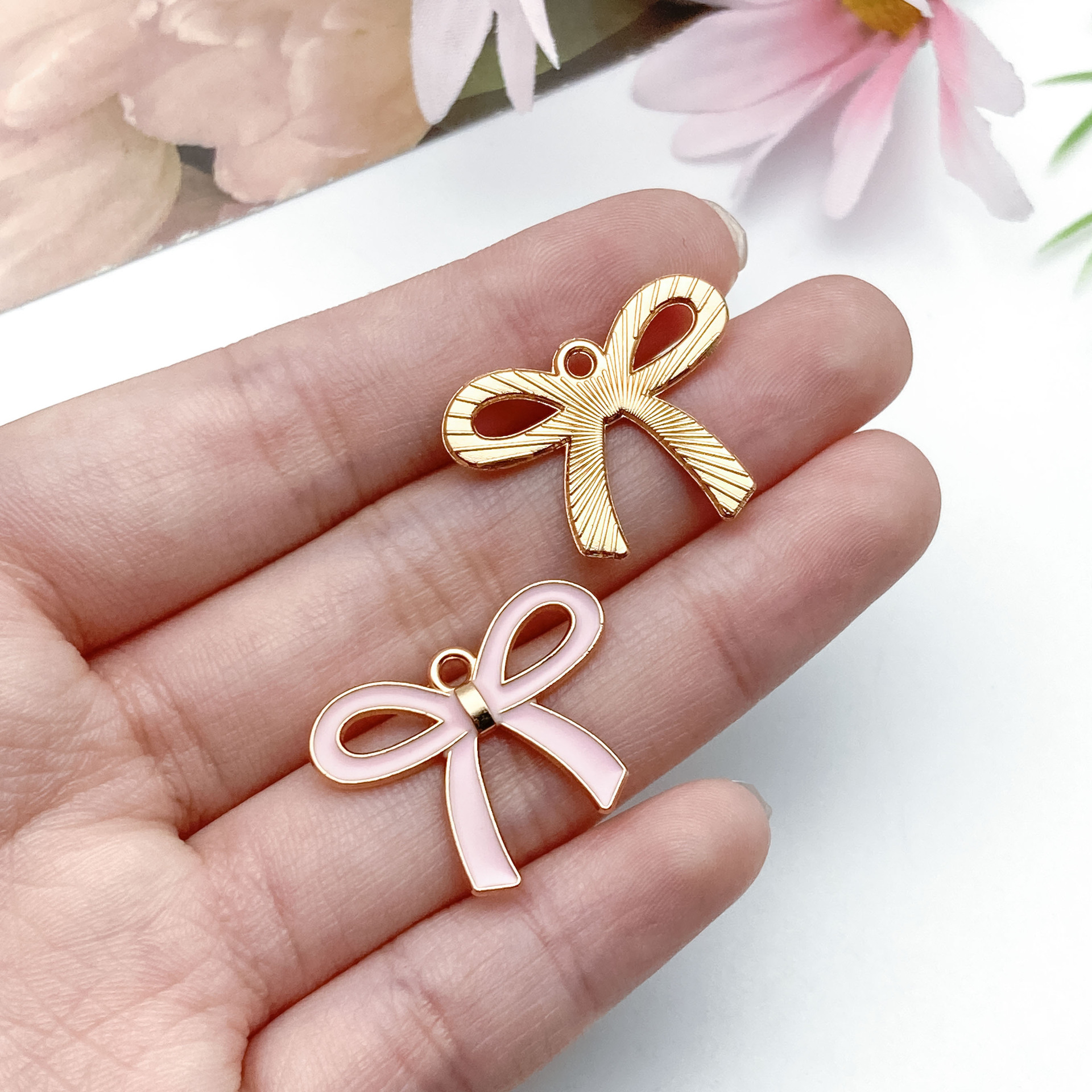 23153-DL-大号kc金粉色滴油锌合金镂空蝴蝶结25&t