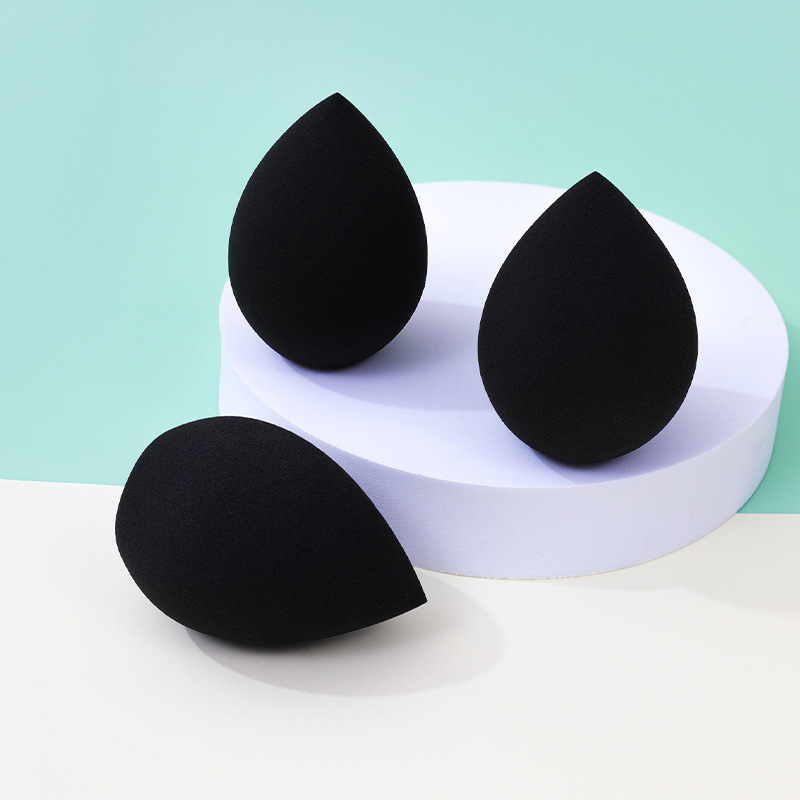 Fábrica personalizada gota de agua gigante polvo de huevo de maquillaje no puede comer polvo de maquillaje húmedo y seco de doble uso esponja de maquillaje huevo de maquillaje