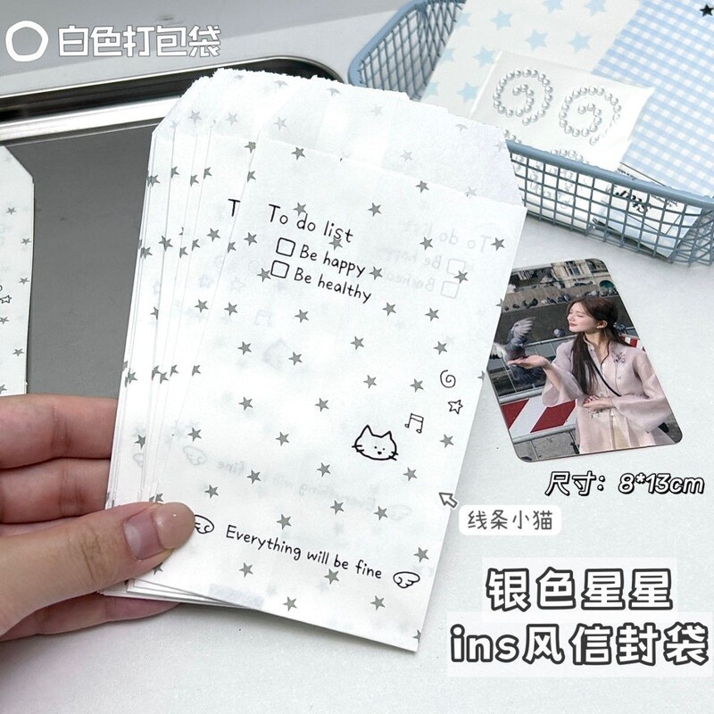 Silver star ins white paper bag, kitten gift packaging, kraft paper bag, product packaging material, creative packaging