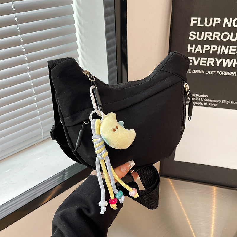 Bolsa de hombro deportiva casual coreana para hombres y mujeres, bolsas de bolsas de bolsas para niños de color sólido.