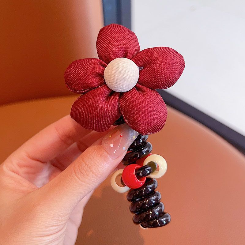 Línea telefónica de flores rojas