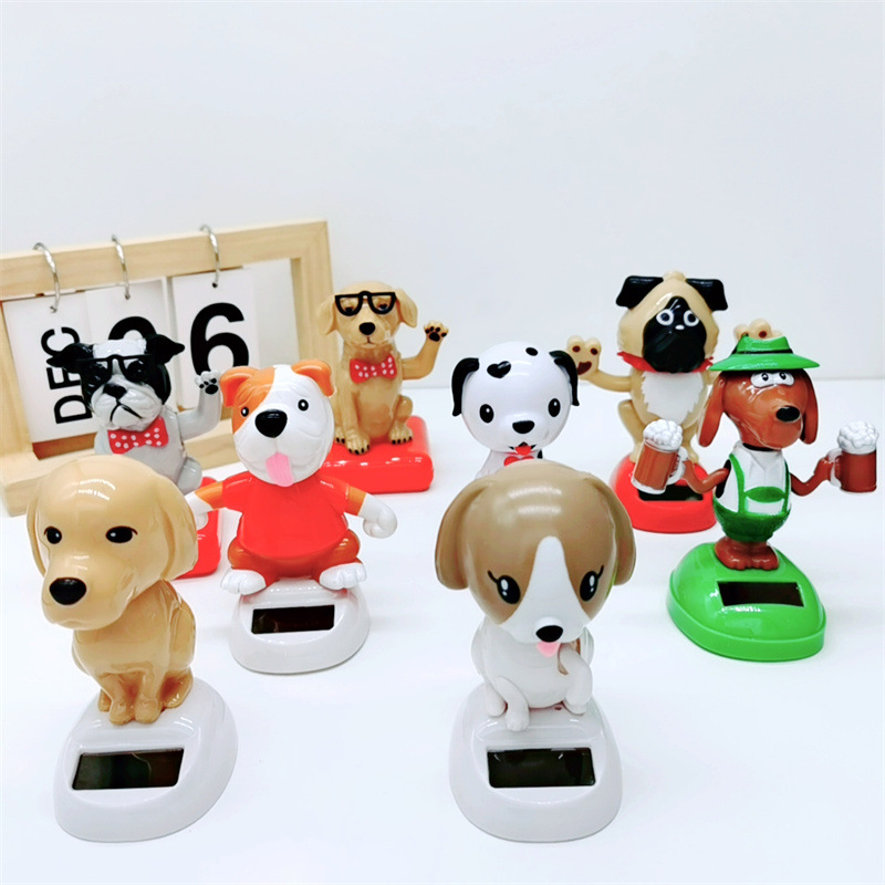 Adornos para automóviles cruzados, decoración para automóviles de resina, accesorios interiores para perros de palomitas de maíz para automóviles solares, sacudiendo la cabeza y llamando a la muñeca