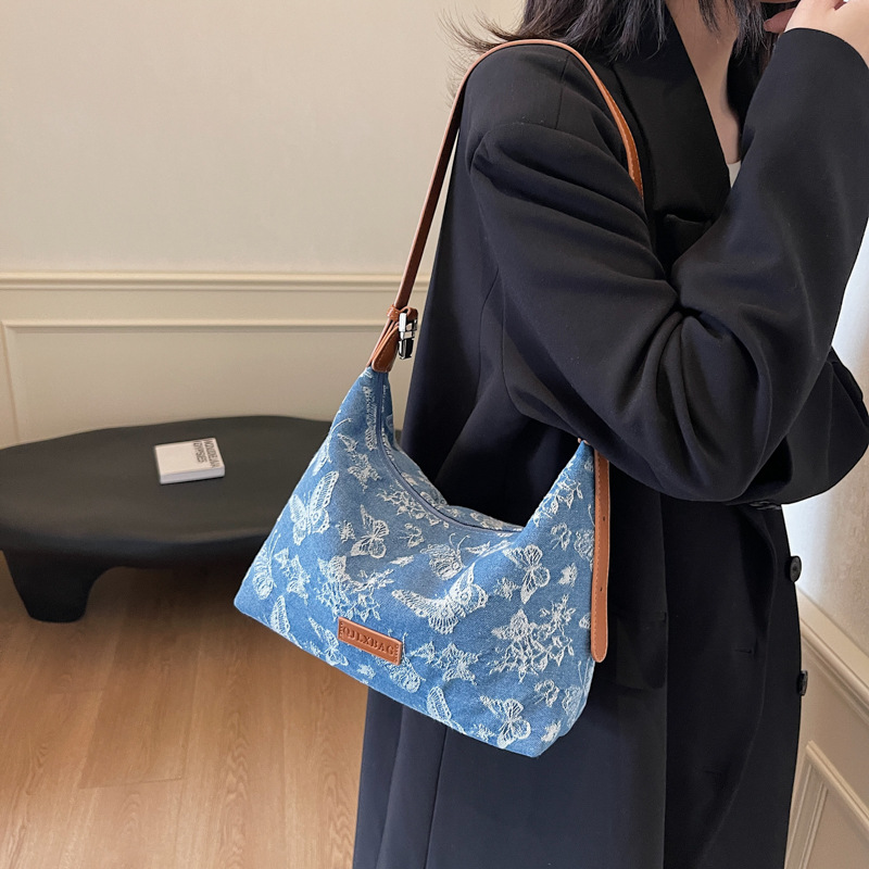 2024 nuevo bolso de viaje de mezclilla casual de gran capacidad con estampado de todo fósforo para mujer bolso de axila de un solo hombro