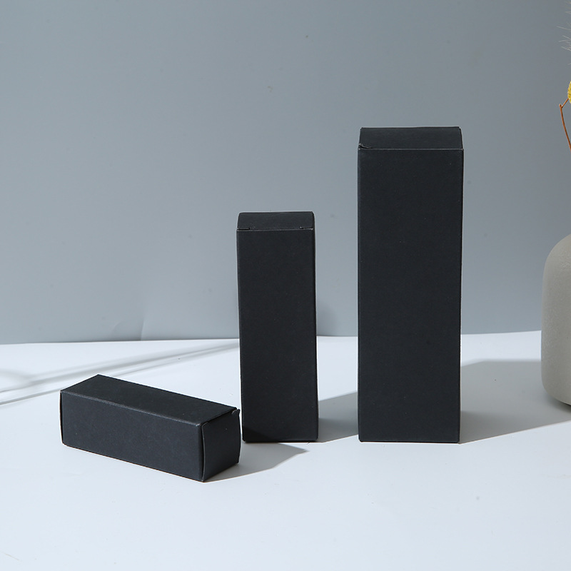 Caja de embalaje de papel Kraft rectangular cosméticos productos para el cuidado de la piel caja de embalaje al por mayor engrosada Tarjeta blanca y negra Cartón plegable