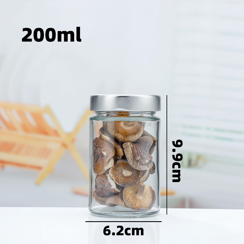 Fabricantes al por mayor botella de miel de tapa alta botella de vidrio de encurtidos redondos olla de almacenamiento de encurtidos de cocina botella de salsa de carne de res con salsa de chile