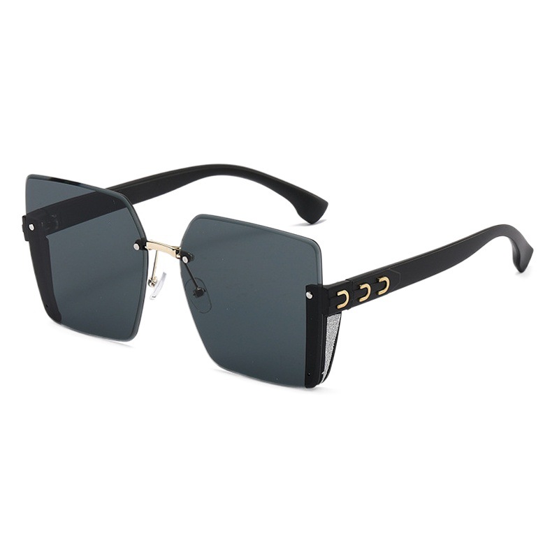 Nuevas gafas de sol de moda de alta calidad sin marco de borde de corte de las mujeres gafas de sol de gran marco a prueba de rayos UV gafas de sol de moda