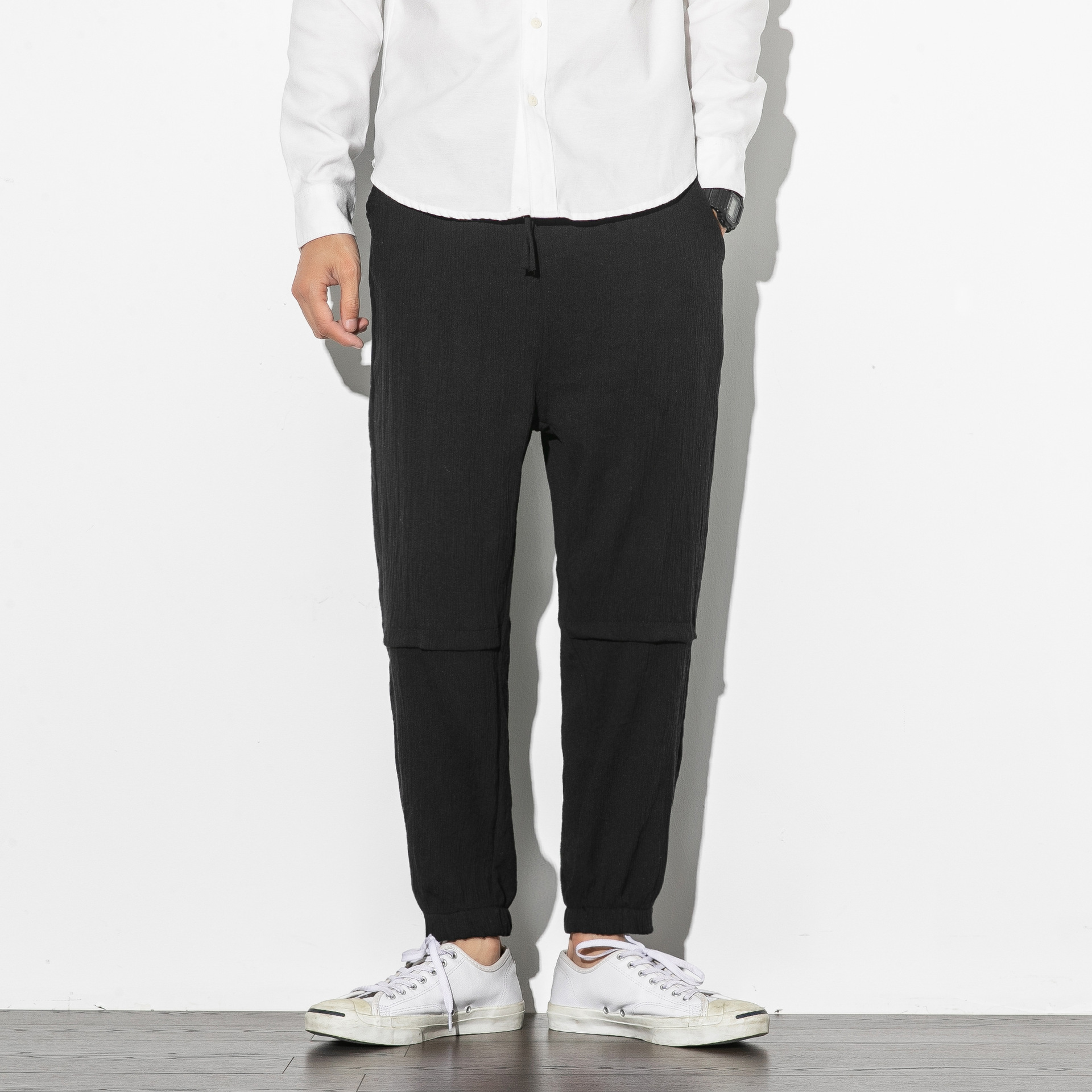 Pantalones casuales de lino Pantalones harem sueltos delgados de verano para hombres Pantalones de pies Pantalones cortos de algodón y lino de moda Pantalones de linterna