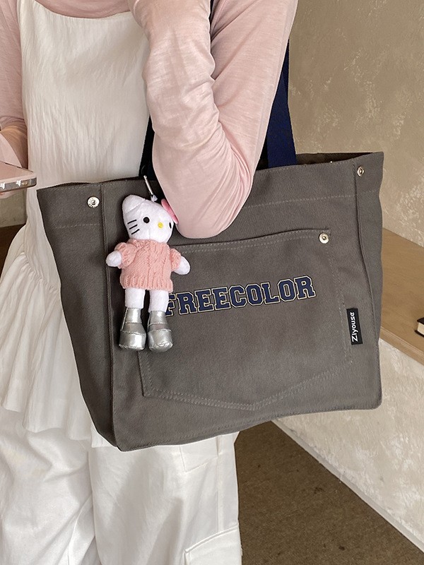Bolso de lona para mujeres 2026 nuevo bolso de mano casual fuerte de gran capacidad textura alta bolso de viaje coreano