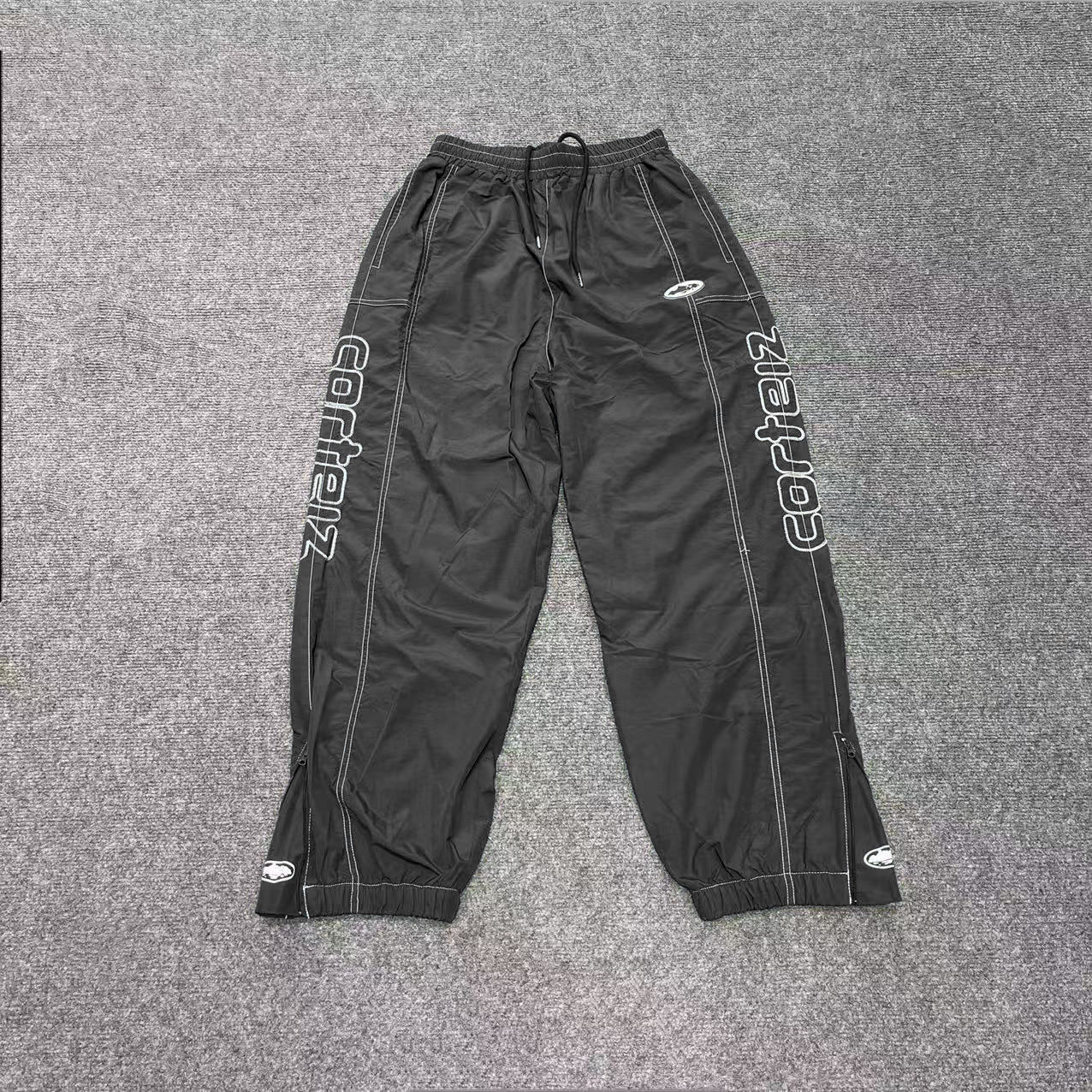 Corteiz 3M Reflective Shell Pants Black