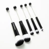 Black brush handle + black bristles