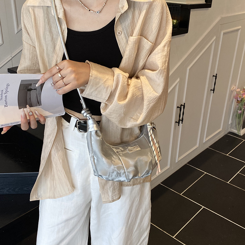 Bolsa de brazo simple coreana para mujeres 2025, nueva bolsa de hombro de empalme extranjero para trabajar, bolsa de mochila ocio
