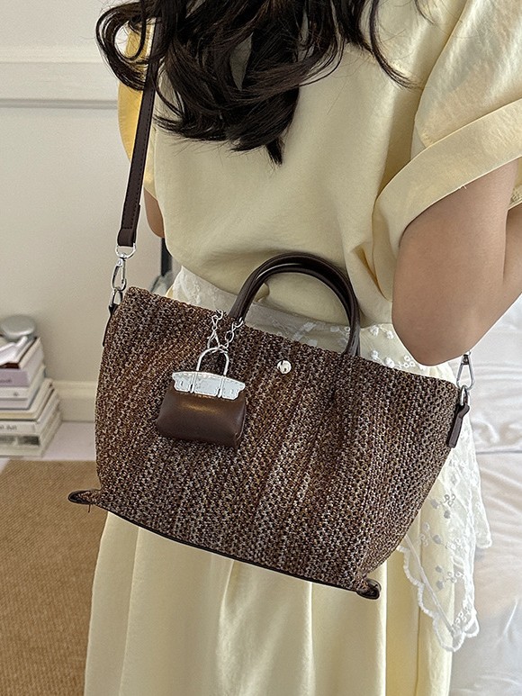 Moda de gran capacidad nueva bolsa de tejido portátil nicho de diseño de vacaciones estilo de mar ocio mochila de hombro
