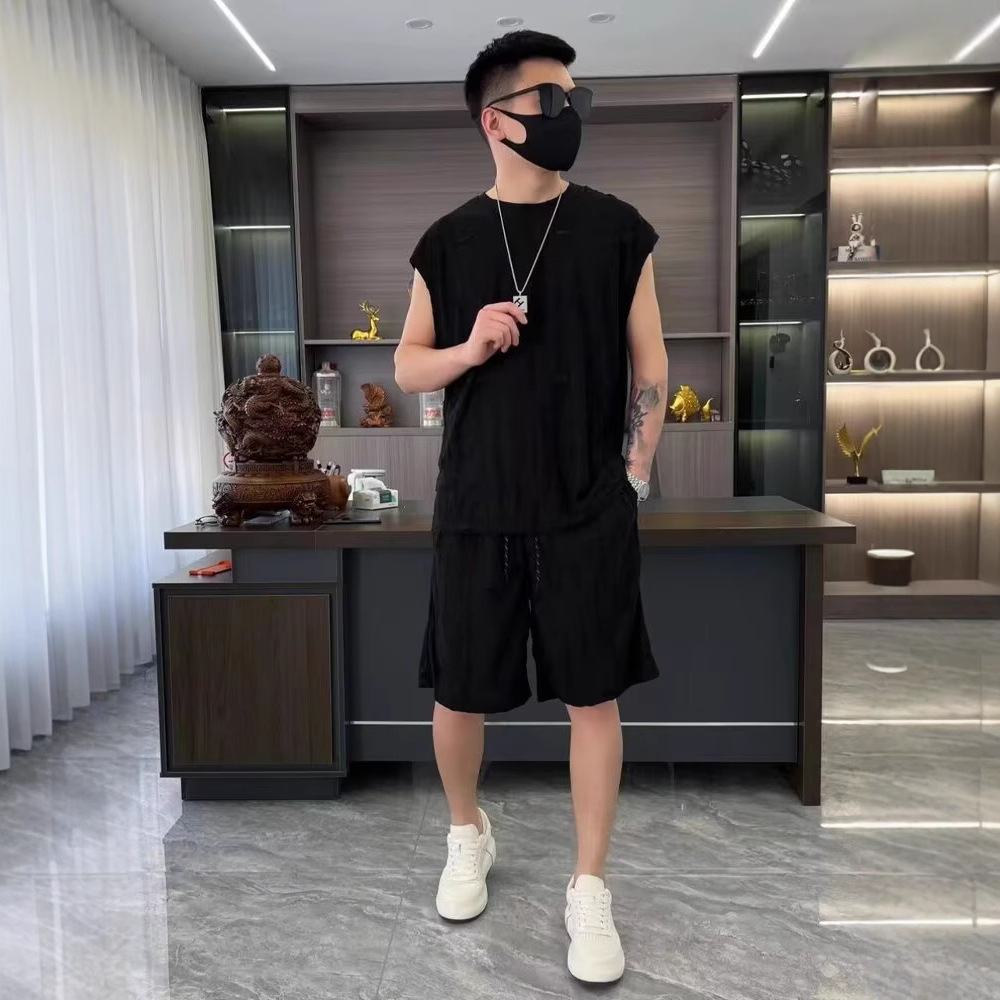 Verano nuevo estilo de hombre estilo de Hong Kong hueco agujero conjunto casual marca de moda chaleco de hombro corto conjunto de dos piezas