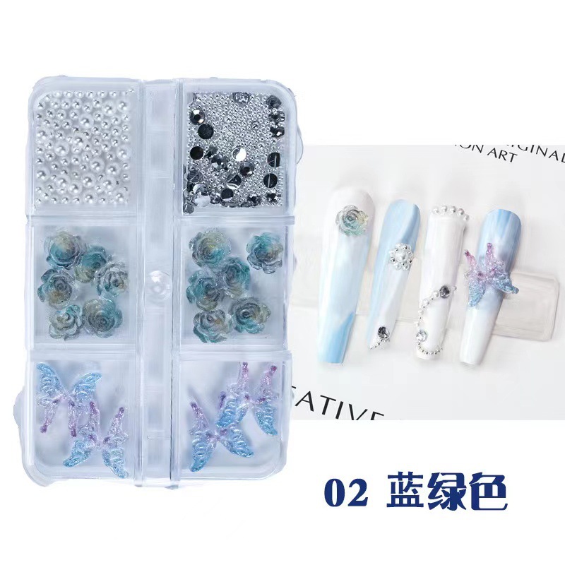 Transfronteriza nueva manicura tridimensional Camelia joyería líquido gradiente mariposa pequeña bola de acero perla mixta accesorios de uñas