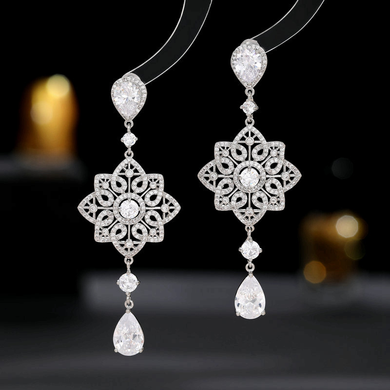 Light luxury high-end heavy industry earrings banquet dress with long hollow pattern water drop earrings_voghion.com