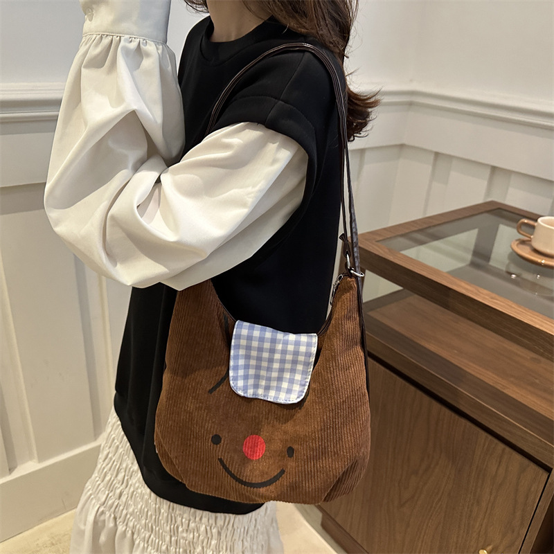 Vintage velcro nariz roja sonriente bolso de mano para mujeres otoño y invierno 2024 gran capacidad mochila de viaje mochila