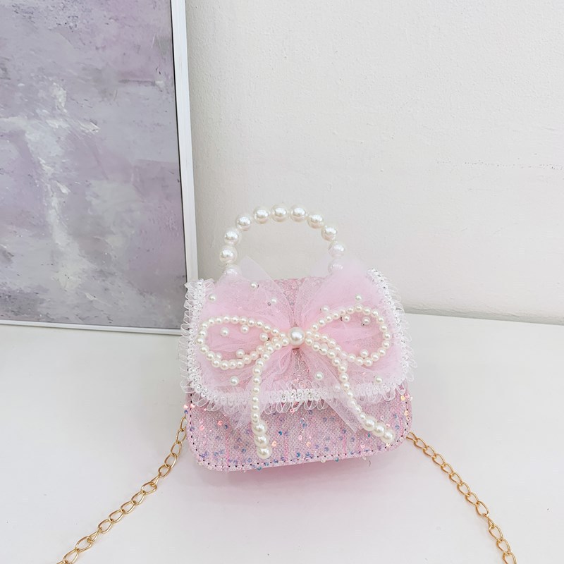 Accesorios para niños bolsos de moda de verano bolsos de mochila para chicas bolsos de mano princesa de perlas bolsos de cambio de viento fragante