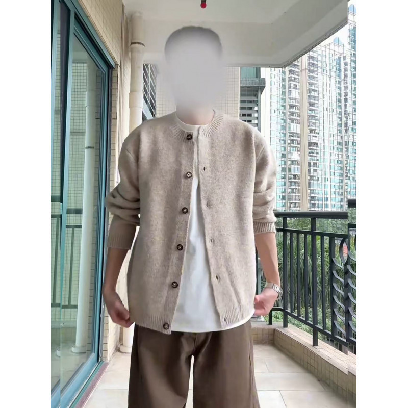 Apricot-colored cardigan sweater, men's style, with a relaxed and casual vibe, knitted sweater, casual outerwear with a "old money" aesthetic, thick Apricot-colored cardigan sweater, men's style, with a relaxed and casual vibe, knitted sweater, casual outerwear with a "old money" aesthetic, thick