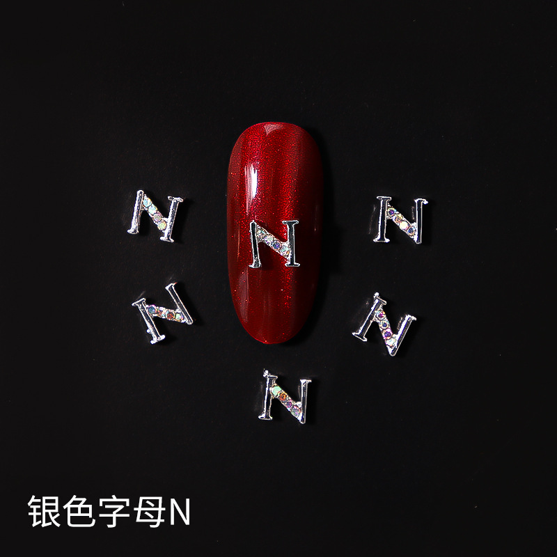 Nueva LZ manicura 26 letras aleación joyería estilo japonés Internet celebridad plata letras manicura joyería clavo Taladro