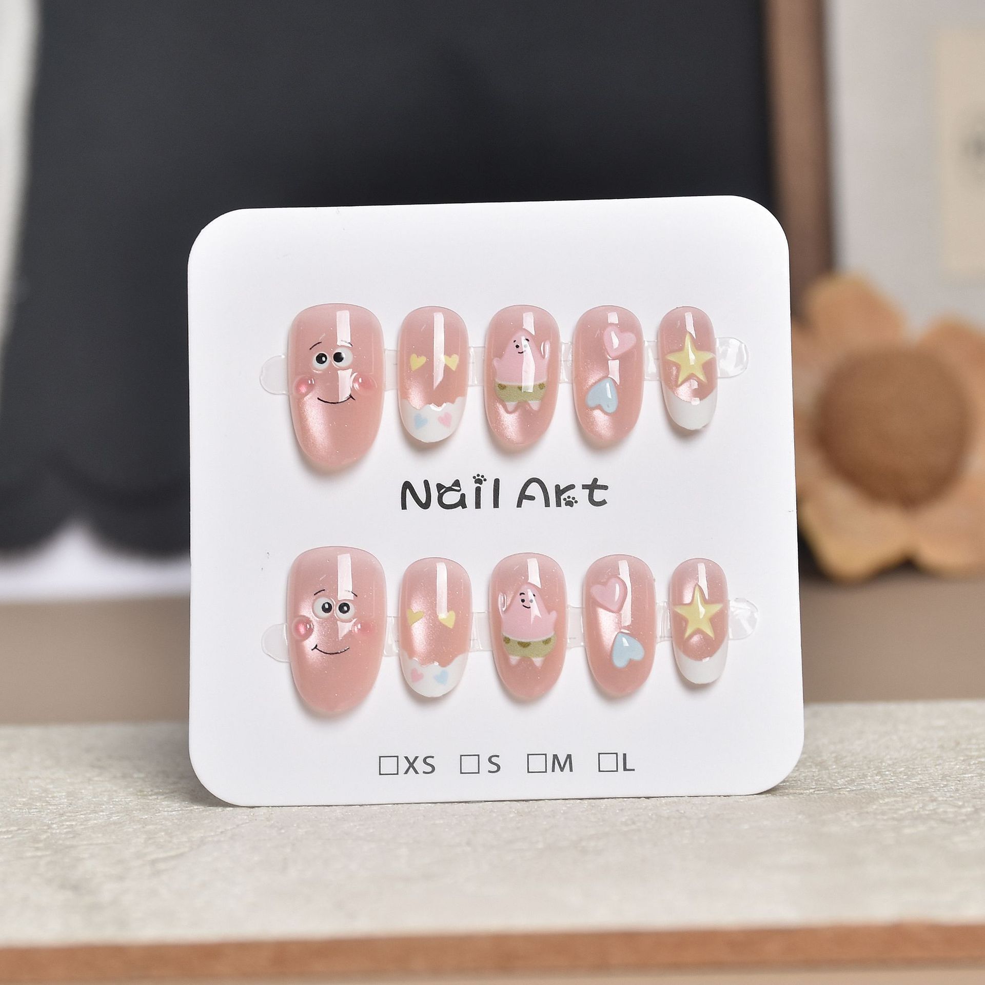 Uñas postizas francesas con diseño floral dorado, estilo ojo de gato, cortas y desmontables, producto de alta gama para arte de uñas 2026.