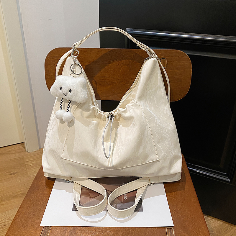 Bolsos de alta sensación de mujer 2024 nueva mochila de hombro, mochila de hombro de gran capacidad, mochila multicapacidad