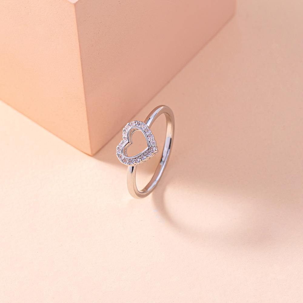 Simple Micro-inlaid Zircon Hollow Heart Copper Ring Wholesale Nihaojewelry display picture 3