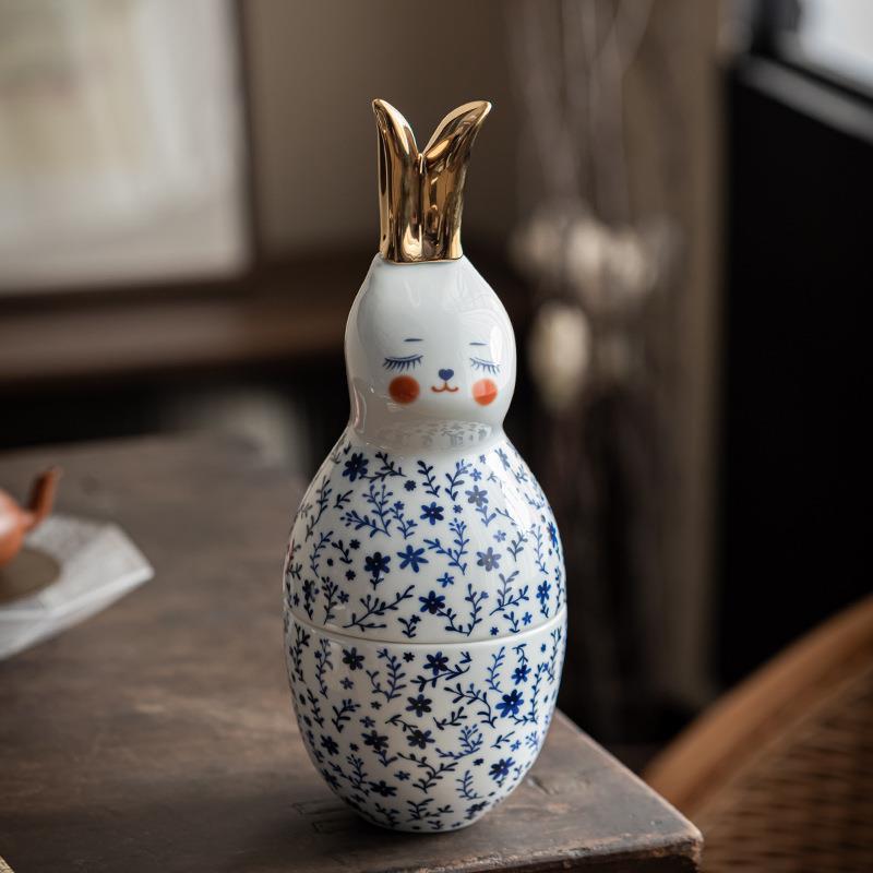 Creativo francés floral conejo té tarro con la selección de té de cerámica dibujo de oro conejo decoración sellada empresa regalo de vacaciones
