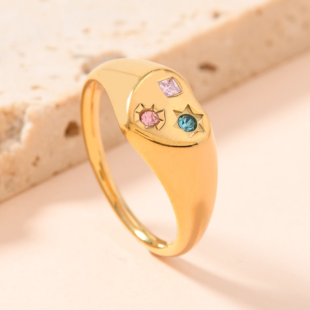 Europa y los Estados Unidos nuevos anillos de acero inoxidable fundidos en forma de corazón hermoso viento micro incrustado de color zircon fábrica de anillos de acero de titanio