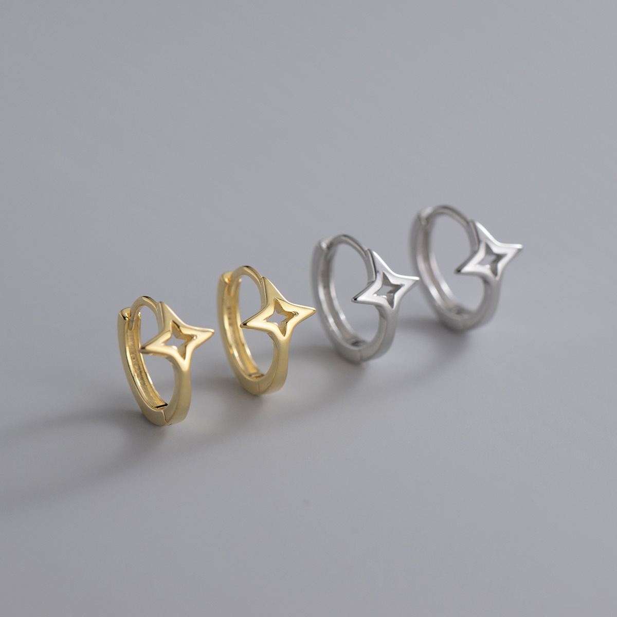 Eloch s925 botón de orejas de plata dulce japonés hueco estrella de cuatro cuadrados personalidad joyería de orejas de moda G9837