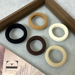 新商品のミルクカレー色の高弾力耐久性のある皮筋シンプルな雰囲気の高馬尾髪ひも