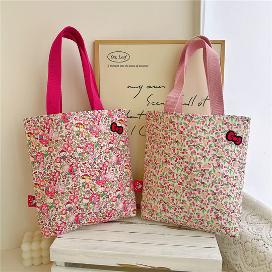 Small floral KT cat cotton shoulder bag small floral element small fresh hand shoulder cloth bag hand bag wholesale