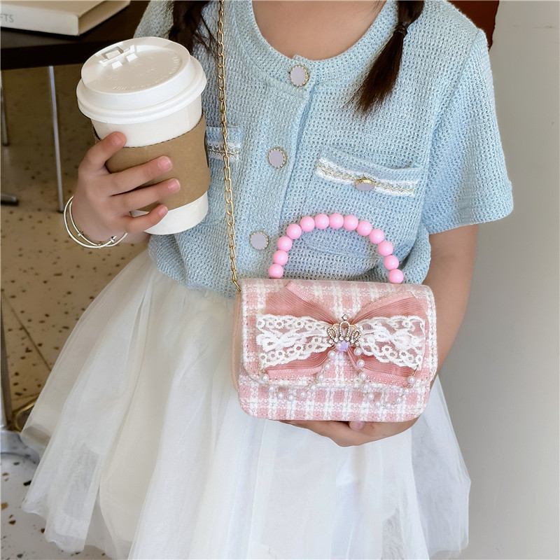 2024 nueva moda lindas bolsas de hombro para niños bolsas de perlas a cuadrícula bolsas extranjeras bolsas de hombro para niñas gran capacidad marea