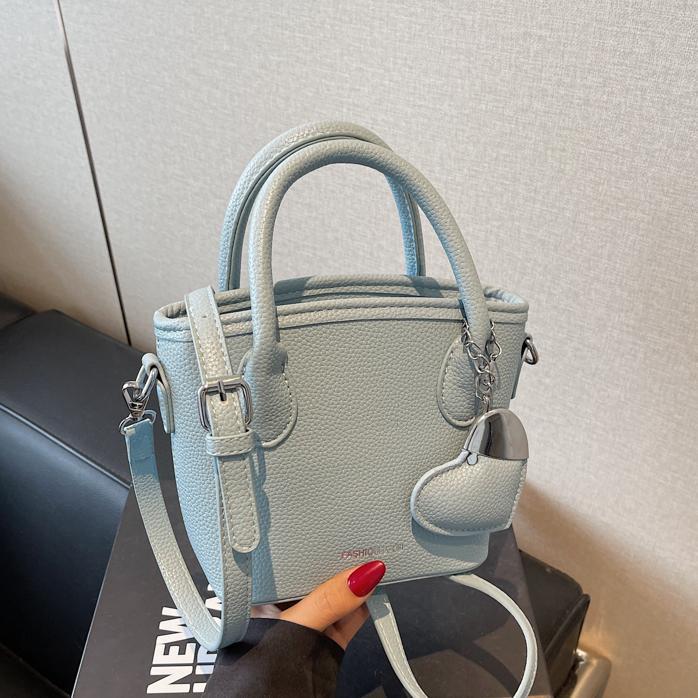 Comercio exterior super fuego mano llevar bolso pequeño mujer 2025 nueva moda todo-fósforo bolso bandolera simple tendencia estilo occidental