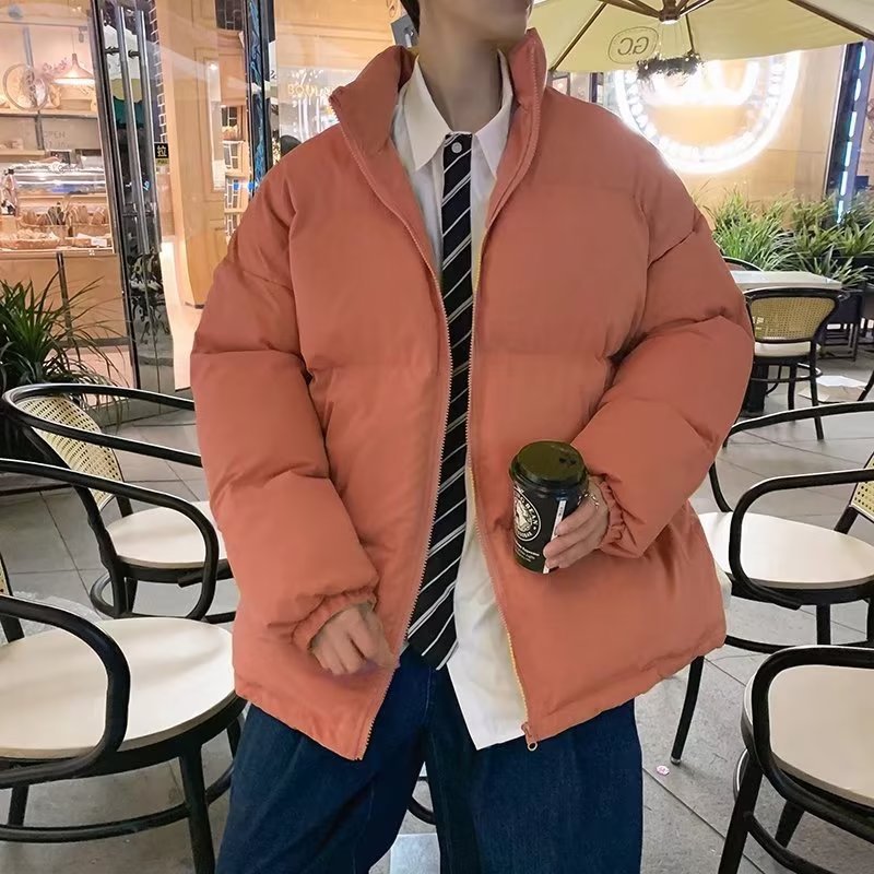 Abrigo de algodón acolchado para hombre de invierno engrosado 2022 nuevo color puro estilo de Hong Kong casual de moda Suelta todo fósforo abrigo de pan caliente
