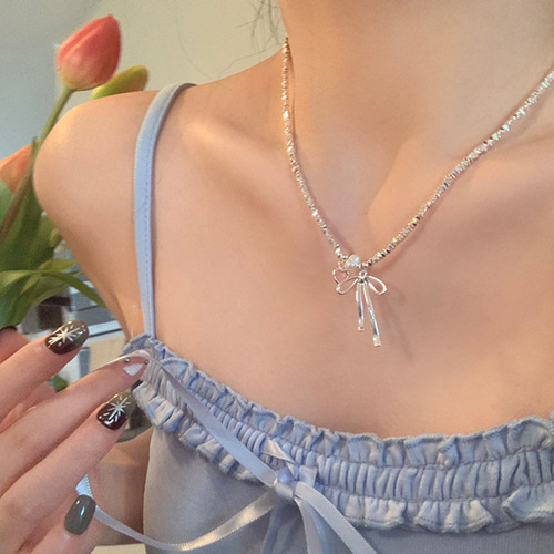 Broken silver metal bow love pearl necklace women's niche design personality versatile high-grade neck chain clavicle chain