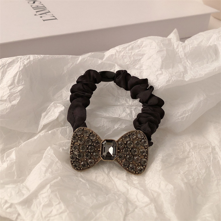 Metal retro conejo negro anillo de cabello de cola de caballo cuerda de cabello elástica de alta altura temperamento banda de goma adornamiento para el cabello