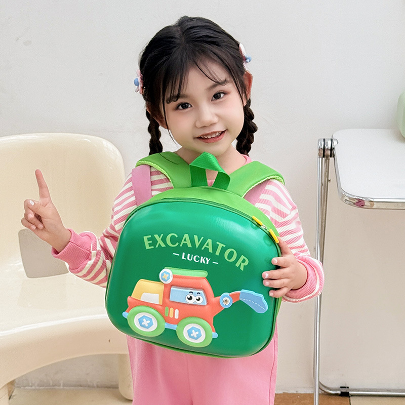 Cute jardín de infantes mochila de bebés excavadora de dibujos animados mochila para niños y niñas 2025 nueva mochila de cáscara de huevo para niños