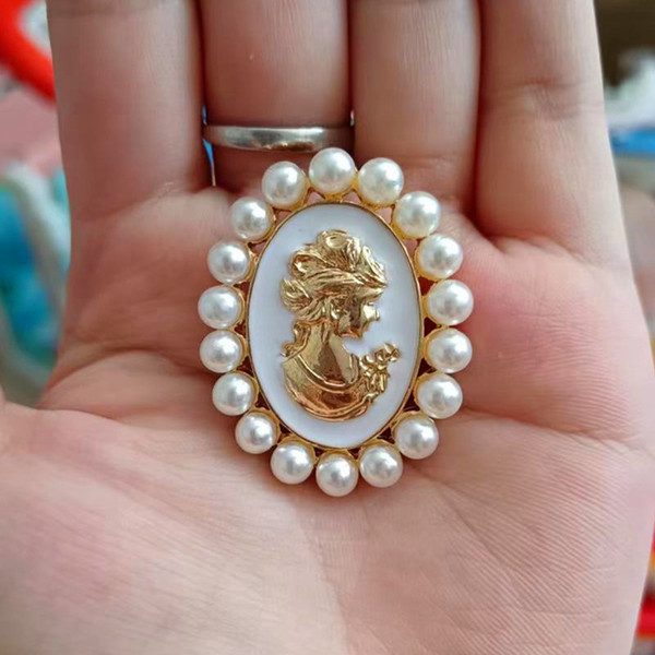 Small brooch