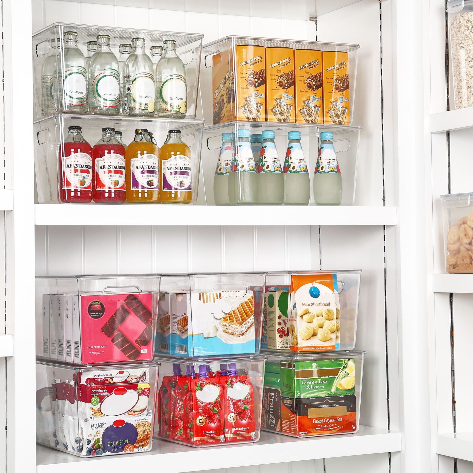 Caja de almacenamiento transparente apilable con asa y tapa, tamaño grande para cocina y dormitorio, artículo popular para almacenar y organizar alimentos.