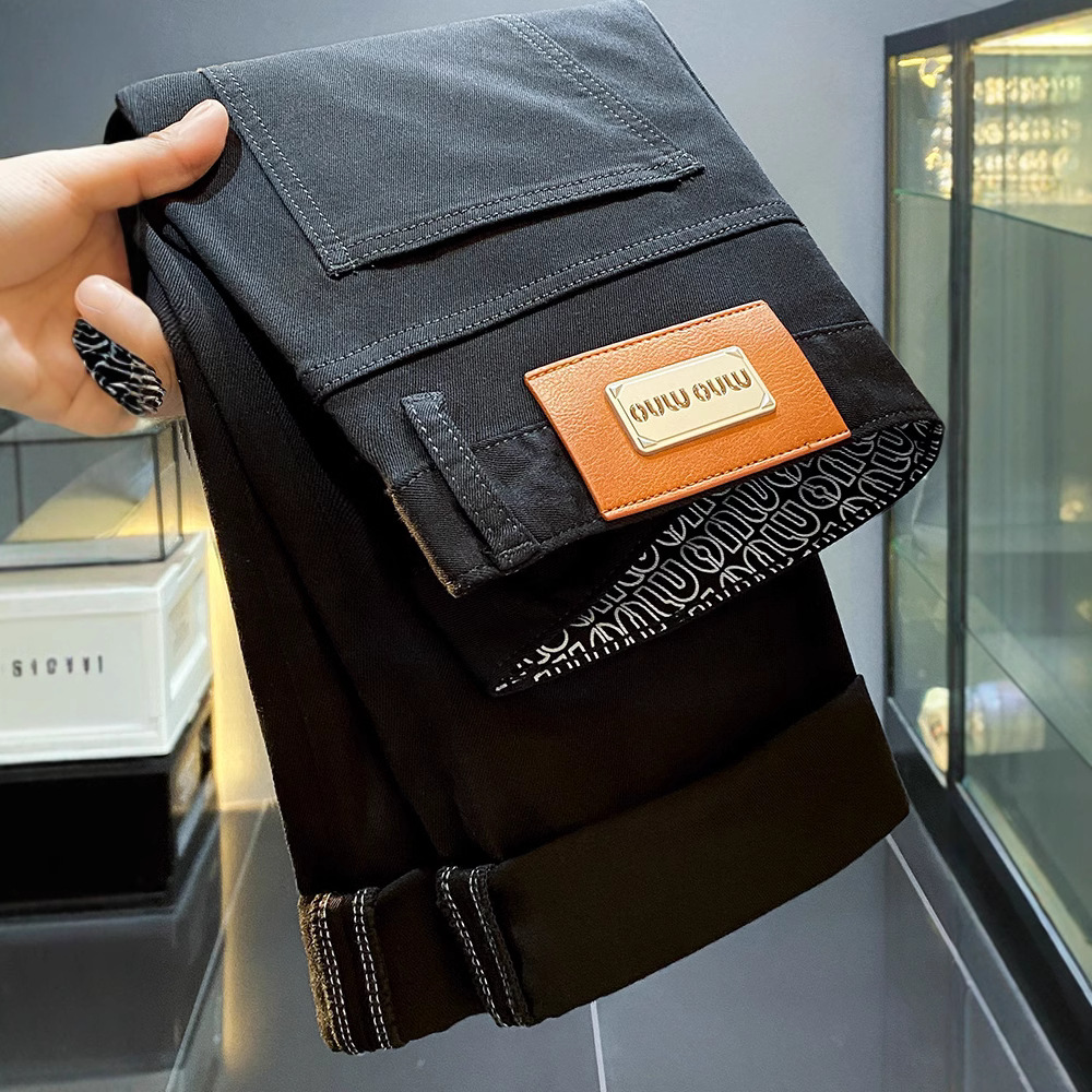 High-end Lesel verano delgado puro negro jeans hombre delgado pie pequeño pantalones americanos de calzado de calzado